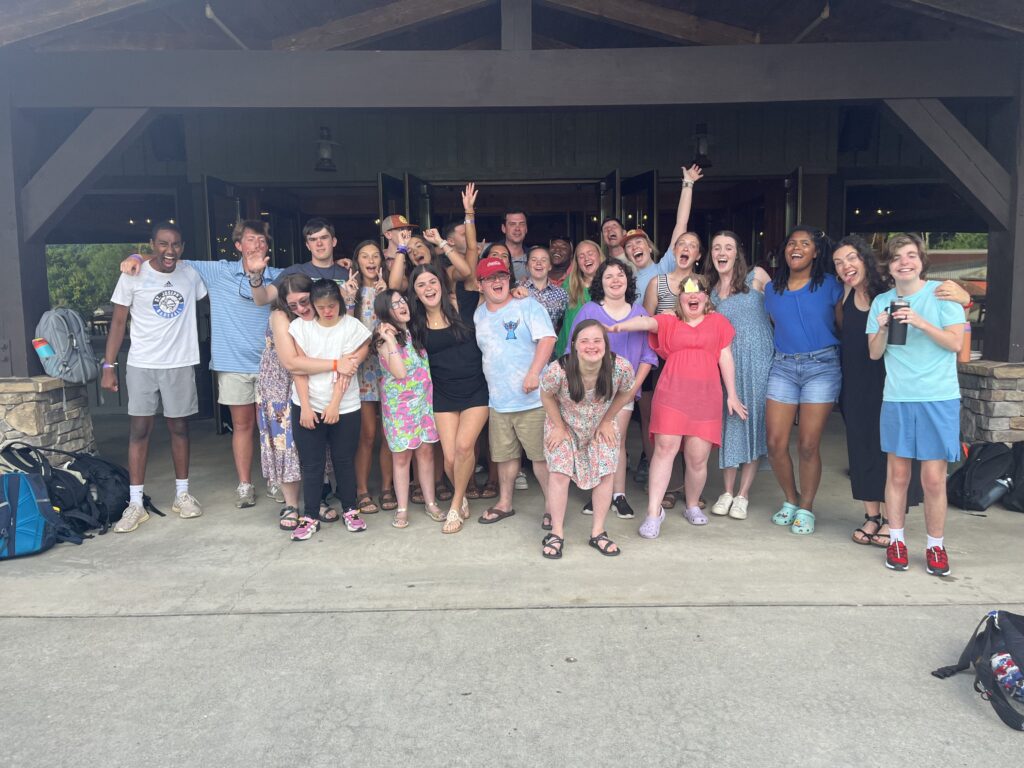 A group of young people pose for the camera.