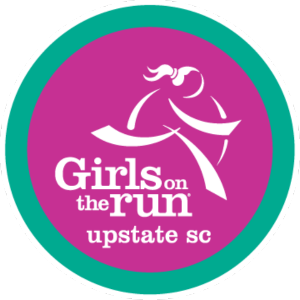 Girls on the Run logo of a pink circle with a white silhouette of a girl running, surrounded by a green border